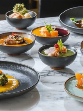 An exquisite presentation of gourmet THC-infused dishes showcasing diverse cuisines on a sophisticated dining table in a Toronto restaurant, reflecting the city's innovative culinary scene.